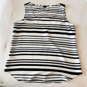 Ann Taylor - Black & white sleeveless blouse (shell). Size L. Silky feel.